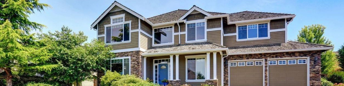 A house with many windows and doors in it